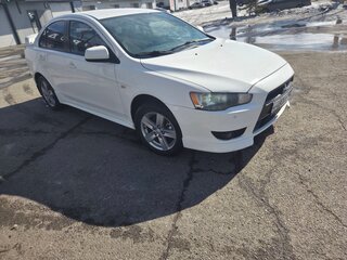 2010 Mitsubishi Lancer X, белый, 800000 рублей, вид 1