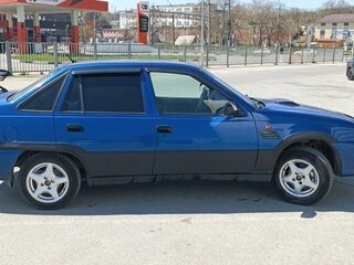 2009 Daewoo Nexia I Рестайлинг, синий, 160000 рублей, вид 4
