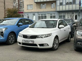 2011 Kia Cerato 6-speed II, белый, 699000 рублей, вид 1