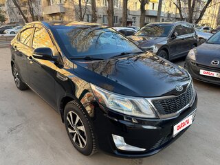 2011 Kia Rio 4-speed III, чёрный, 799000 рублей, вид 1