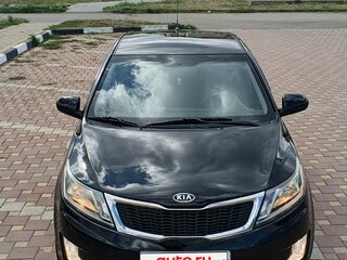 2012 Kia Rio 5-speed III, чёрный, 450000 рублей, вид 2