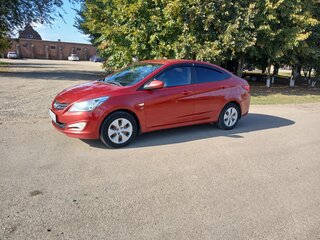 2015 Hyundai Solaris I Рестайлинг, красный, 899000 рублей, вид 1