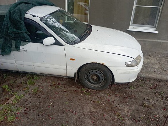 2000 Mazda Capella VI, белый, 150000 рублей - вид 1