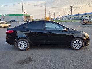 2013 Kia Rio 4-speed III, чёрный, 725000 рублей, вид 5
