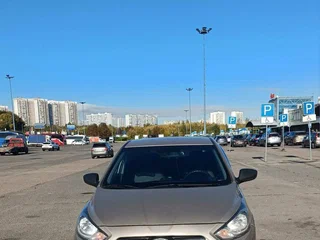 2014 Hyundai Solaris I, бежевый, 730000 рублей, вид 1