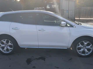 2010 Mazda CX-7 I Рестайлинг, белый, 850000 рублей, вид 3