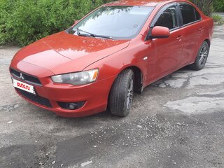 2008 Mitsubishi Lancer X, красный, 530000 рублей, вид 2