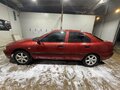1999 Mitsubishi Carisma I Рестайлинг, пурпурный - вид 1