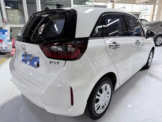 2023 Honda Fit IV Рестайлинг, белый, 1050077 рублей, вид 4