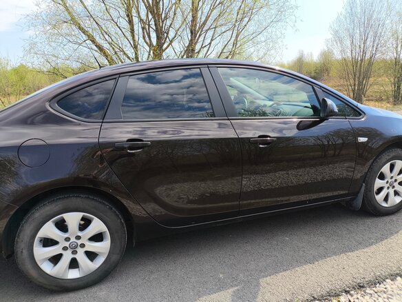 2014 Opel Astra J Рестайлинг, коричневый, 750000 рублей - вид 6