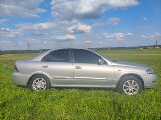 2010 Nissan Almera Classic I, серебристый, 550000 рублей, вид 4