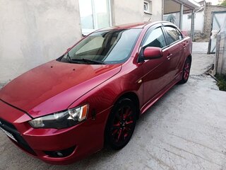 2008 Mitsubishi Lancer X, красный, 710000 рублей, вид 4