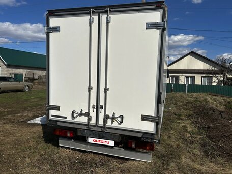 2009 Isuzu Elf (N-series), синий, 1200000 рублей, вид 4