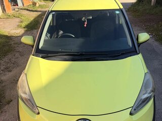2015 Toyota Sienta II, жёлтый, 1225000 рублей, вид 2