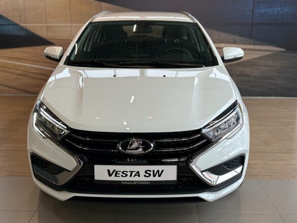 2026 Lada (ВАЗ) Vesta SW I Рестайлинг (NG), белый, 1915000 рублей - вид 1