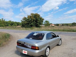 1992 Toyota Sprinter VII (E100), коричневый, 300000 рублей, вид 2