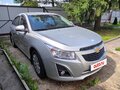 2014 Chevrolet Cruze I Рестайлинг, серебристый, 1050000 рублей - вид 1