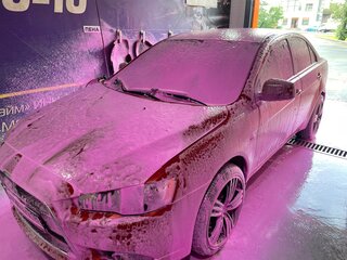 2011 Mitsubishi Lancer X Рестайлинг, красный, 850000 рублей, вид 3