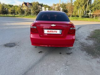 2011 Chevrolet Aveo I Рестайлинг, красный, 450000 рублей, вид 4