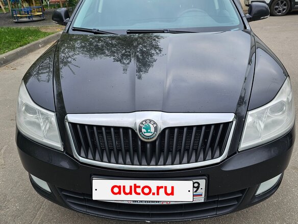 2011 Skoda Octavia II (A5) Рестайлинг, чёрный, 755000 рублей