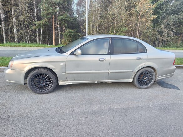 2000 Daewoo Magnus, коричневый, 130000 рублей - вид 4