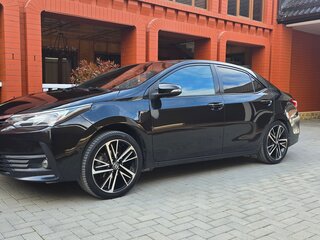 2013 Toyota Corolla XI (E160, E170, E180), чёрный, 950000 рублей, вид 1