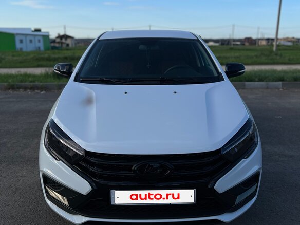 2024 Lada (ВАЗ) Vesta I Рестайлинг (NG), белый, 1559000 рублей - вид 1