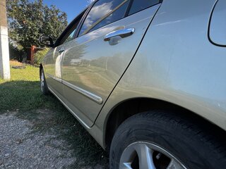 2004 Toyota Corolla IX (E120, E130) Рестайлинг, золотистый, 520000 рублей, вид 4