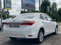 2014 Toyota Corolla XI (E160, E170, E180), белый, 1239000 рублей - вид 4