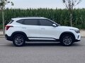2023 Kia Seltos I Рестайлинг, белый, 1870005 рублей - вид 5