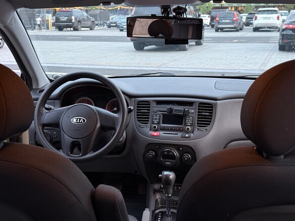 2011 Kia Rio II Рестайлинг, бежевый - вид 12