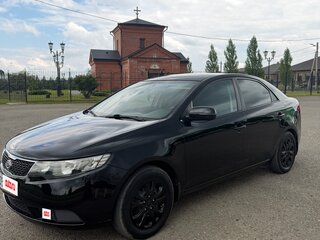 2012 Kia Cerato 6-speed II, чёрный, 725000 рублей, вид 1