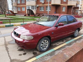 1999 Daewoo Nubira I, пурпурный, 140000 рублей, вид 1