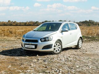 2012 Chevrolet Aveo II, серебристый, 670000 рублей, вид 1