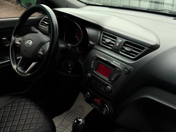 2012 Kia Rio 4-speed III, синий, 800000 рублей - вид 15