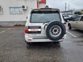 2001 Toyota Land Cruiser Cygnus 100 Series, белый, 1100000 рублей - вид 4