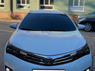 2014 Toyota Corolla XI (E160, E170, E180), белый, 1450000 рублей, вид 2