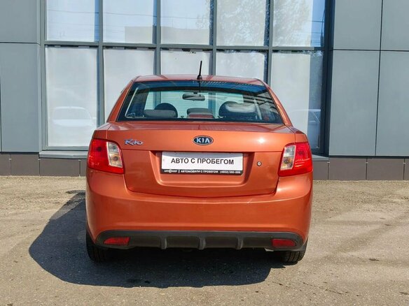 2010 Kia Rio II Рестайлинг, оранжевый - вид 6