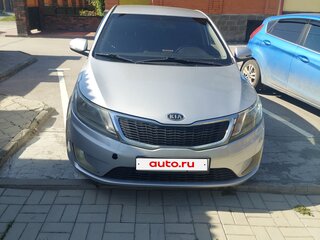 2012 Kia Rio 4-speed III, серебристый, 670000 рублей, вид 1