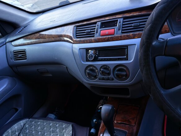 2001 Mitsubishi Lancer Cedia IX, серый, 420000 рублей - вид 24