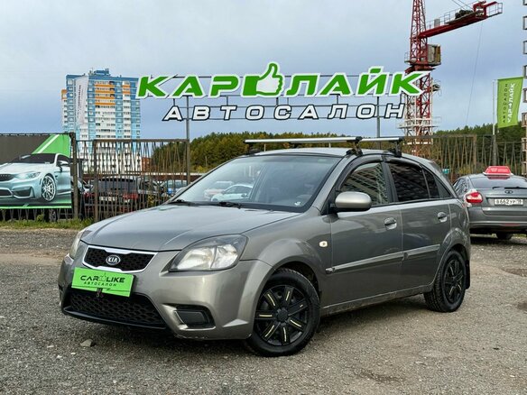 2011 Kia Rio II Рестайлинг, серебристый, 549000 рублей - вид 1