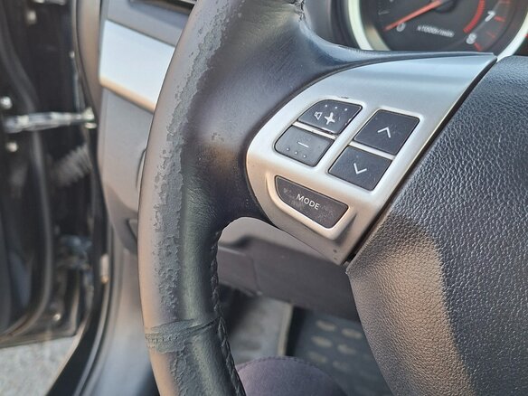 2010 Mitsubishi Lancer X, чёрный, 629000 рублей - вид 10