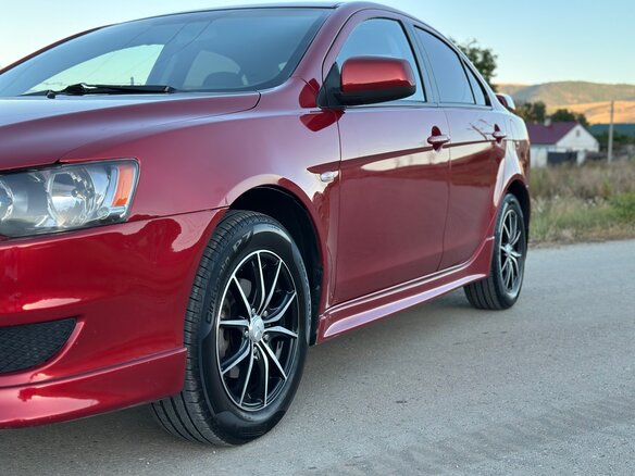 2007 Mitsubishi Lancer X, красный - вид 11