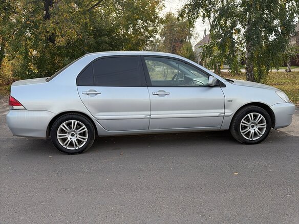 2006 Mitsubishi Lancer IX Рестайлинг, серебристый, 469000 рублей - вид 2