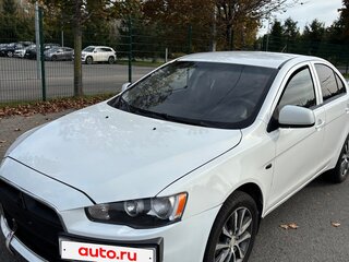 2012 Mitsubishi Lancer X Рестайлинг, белый, 535000 рублей, вид 1
