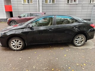 2014 Toyota Corolla XI (E160, E170, E180), чёрный, 1450000 рублей, вид 4