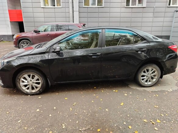2014 Toyota Corolla XI (E160, E170, E180), чёрный, 1450000 рублей - вид 3