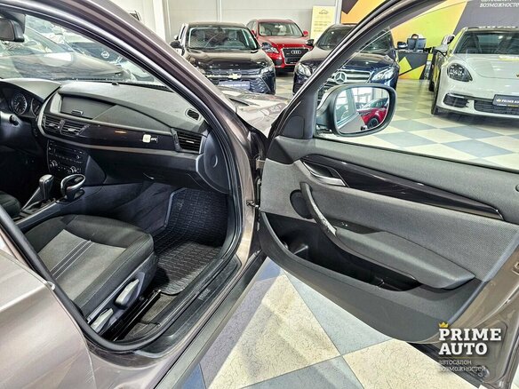 2012 BMW X1 20d I (E84), коричневый - вид 20
