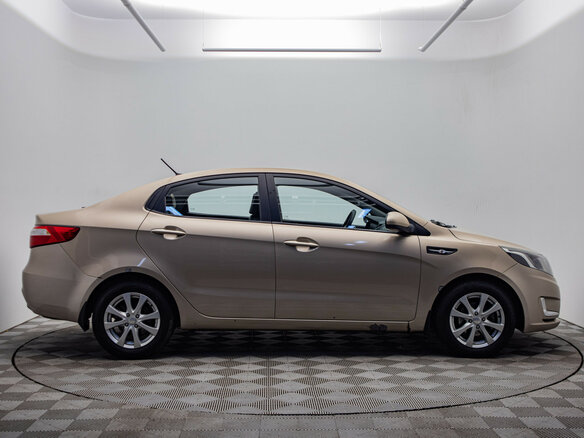 2013 Kia Rio 5-speed III, бежевый - вид 5