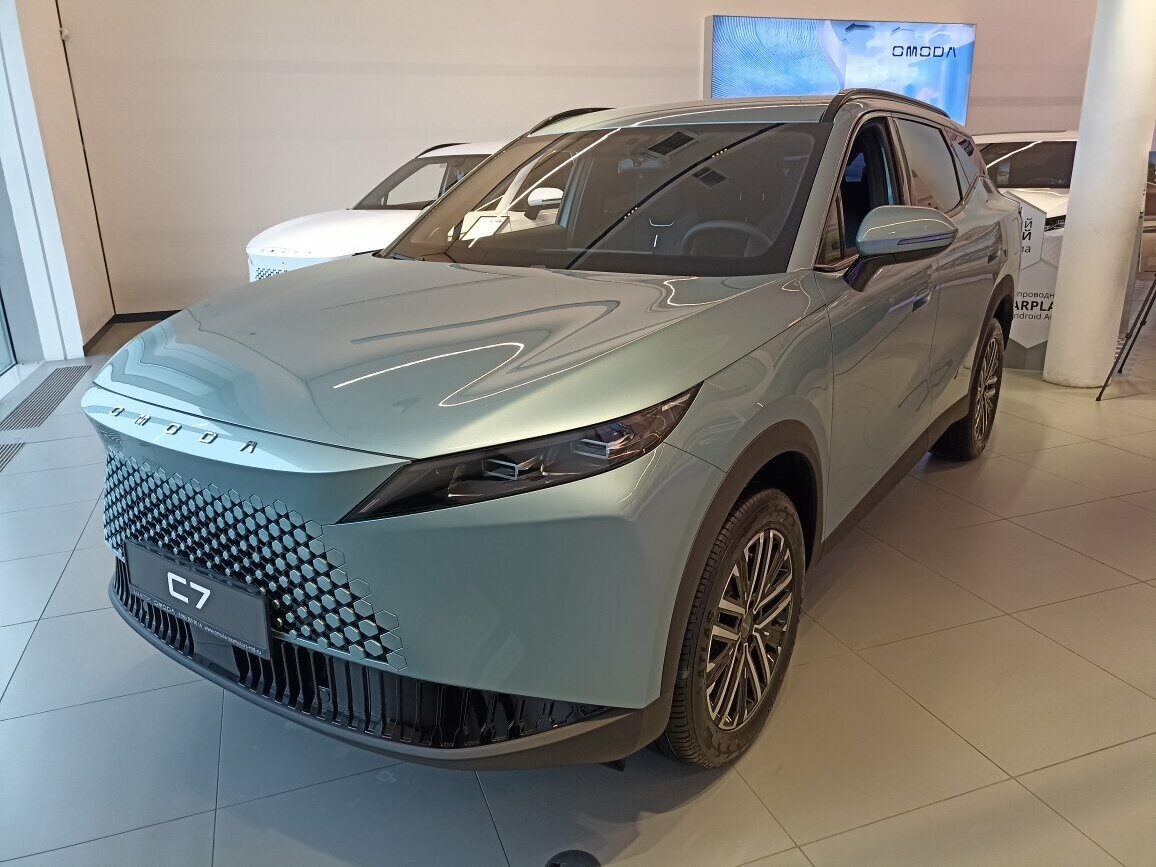 Открыть фотографии: Omoda C7